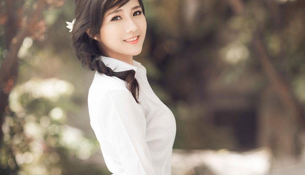 Beautiful girl in Ao dai dress at Hanoi festival