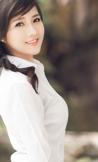 Beautiful girl in Ao dai dress at Hanoi festival